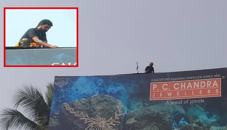 Rourkela youth Muktikant Biswal climbs atop hoarding to stage protest