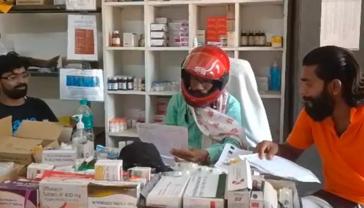 Doctor wears helmet for protection inside hospital as ceiling collapses