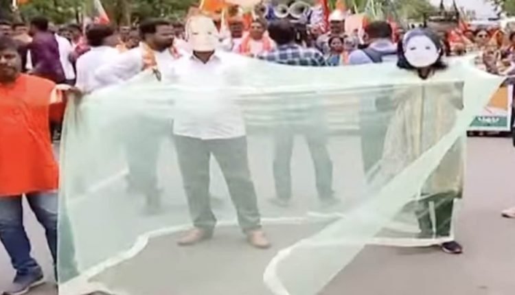 BJP stages 'mosquito net protest' amid rising dengue cases in Bhubaneswar