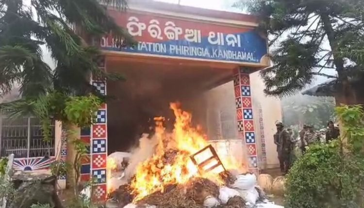 Tension as locals set ablaze Phiringia PS, protest sale of seized ganja by cops